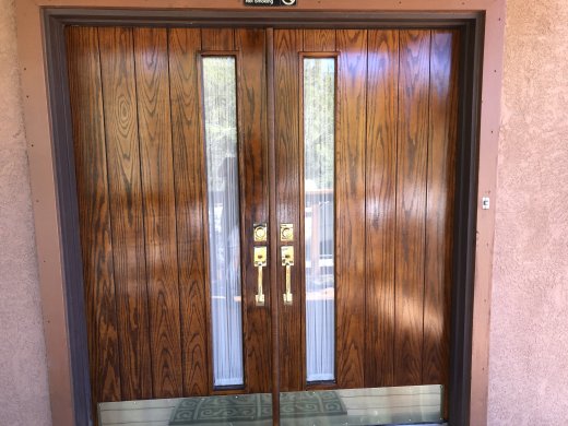 Post re-finish of front door with new kickplates